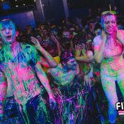 Customers at nightclub dripping in the latest UV paint party scene in the uk