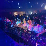 neon glowing clubbers at uv paint party uk