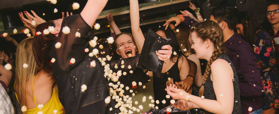 revellers dancing in popcorn party